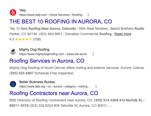 Real Google blue-link results for roofers in Aurora: Yelp, Mighty Dog Roofing and the BBB.
